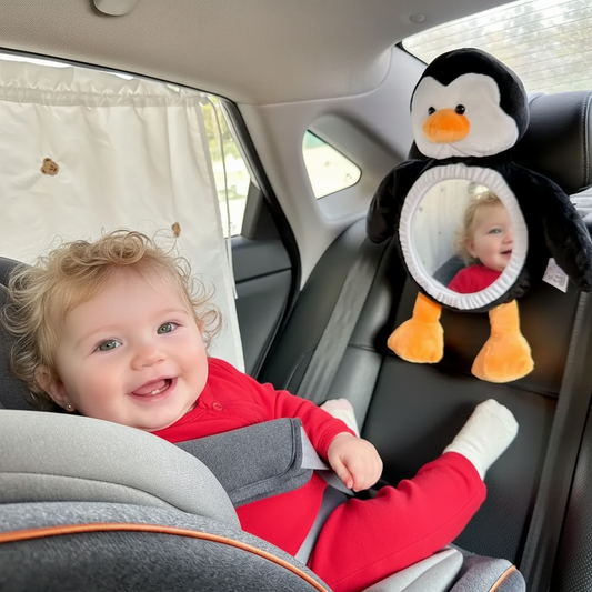 bébé et miroir pingouin sourire enfant