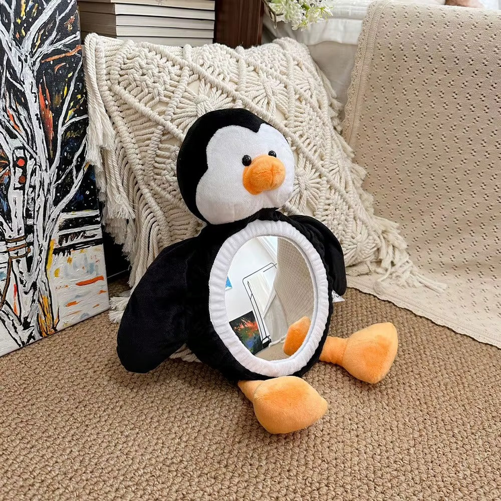 bébé et miroir pingouin