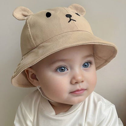 chapeau bébé camel yeux bleu