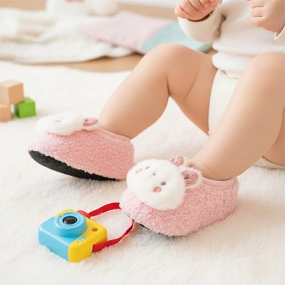 Chausson bébé rose appareil photo