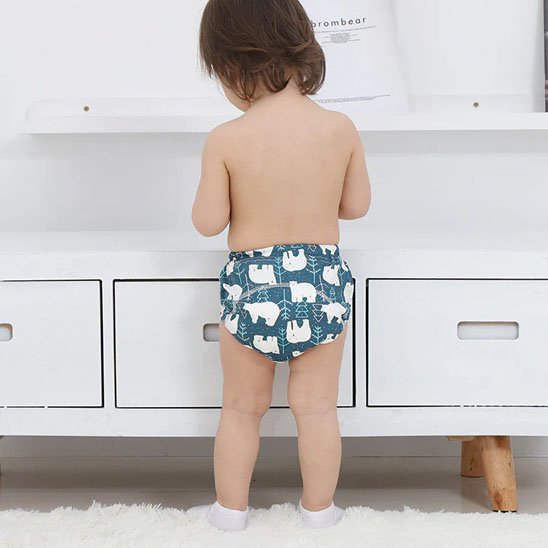 Couche lavable ours blanc meuble