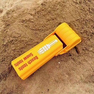 Jouet de plage image variante sur le sable