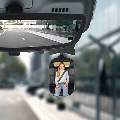 miroir voiture bébé avec grande fille