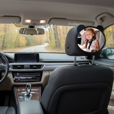 miroir voiture bébé fille sourit