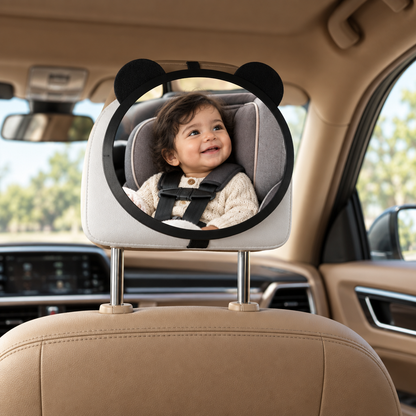 miroir voiture bébé garçon regarde côté chandail laine beige