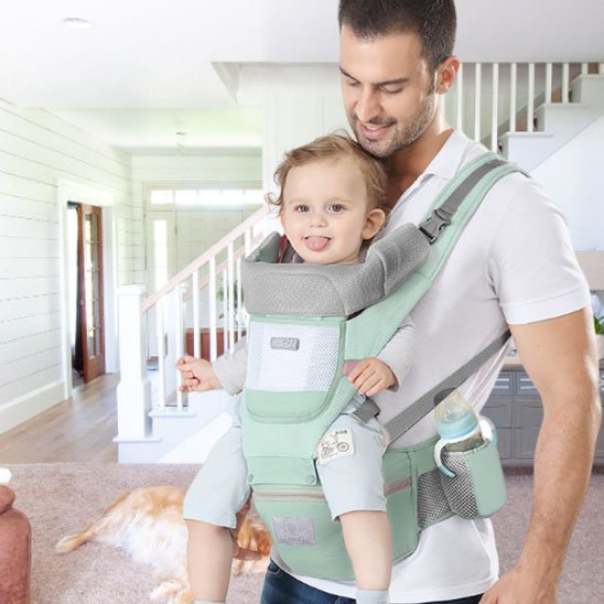 porte bébé vert papa devant