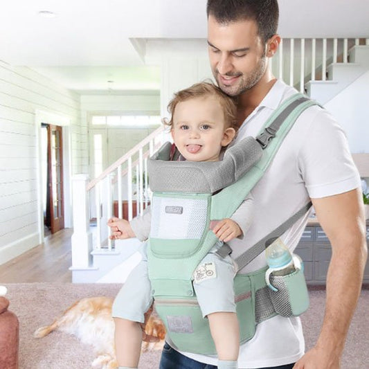 porte bébé vert papa devant