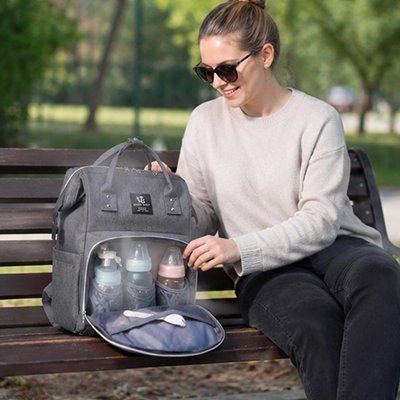 sac à dos à langer gris maman banc parc