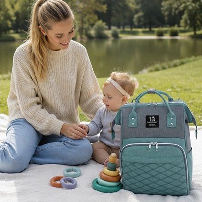 sac à dos à langer vert maman couverture bébé