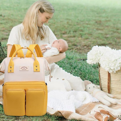 sac a dos bebe jaune gazon