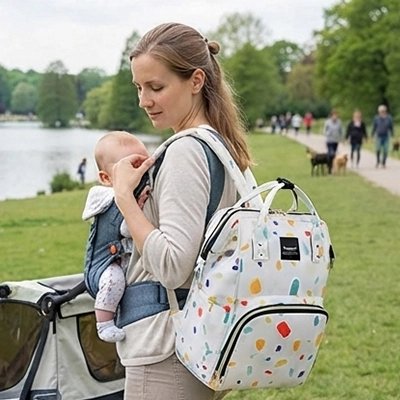 sac à langer à dos maman blanc bord de l'eau
