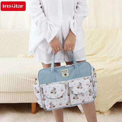 sac a langer a la main