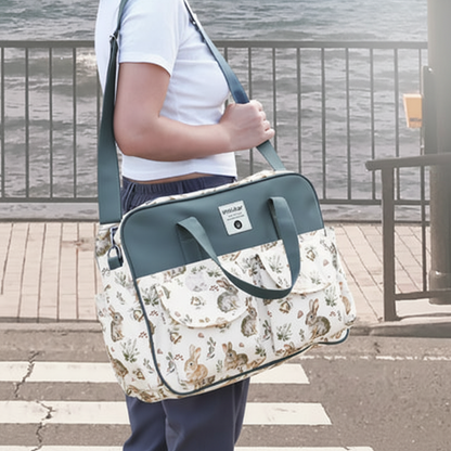 sac a langer bandouillière