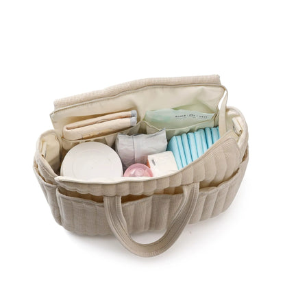 sac a langer bebe beige remplis